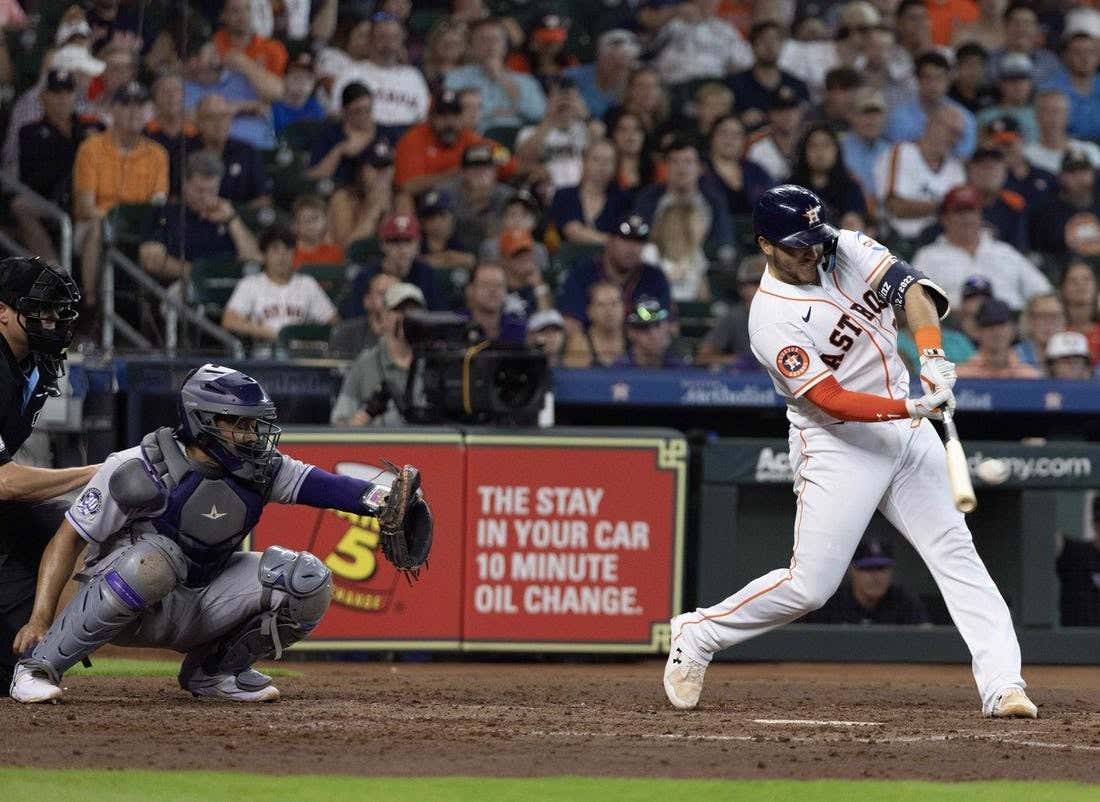 Jul 5, 2023; Houston, TX, USA; Houston Astros catcher Yana Diaz (21) hits out in the fourth inning against the Colorado Rockies at Minute Maid Park Two home runs.